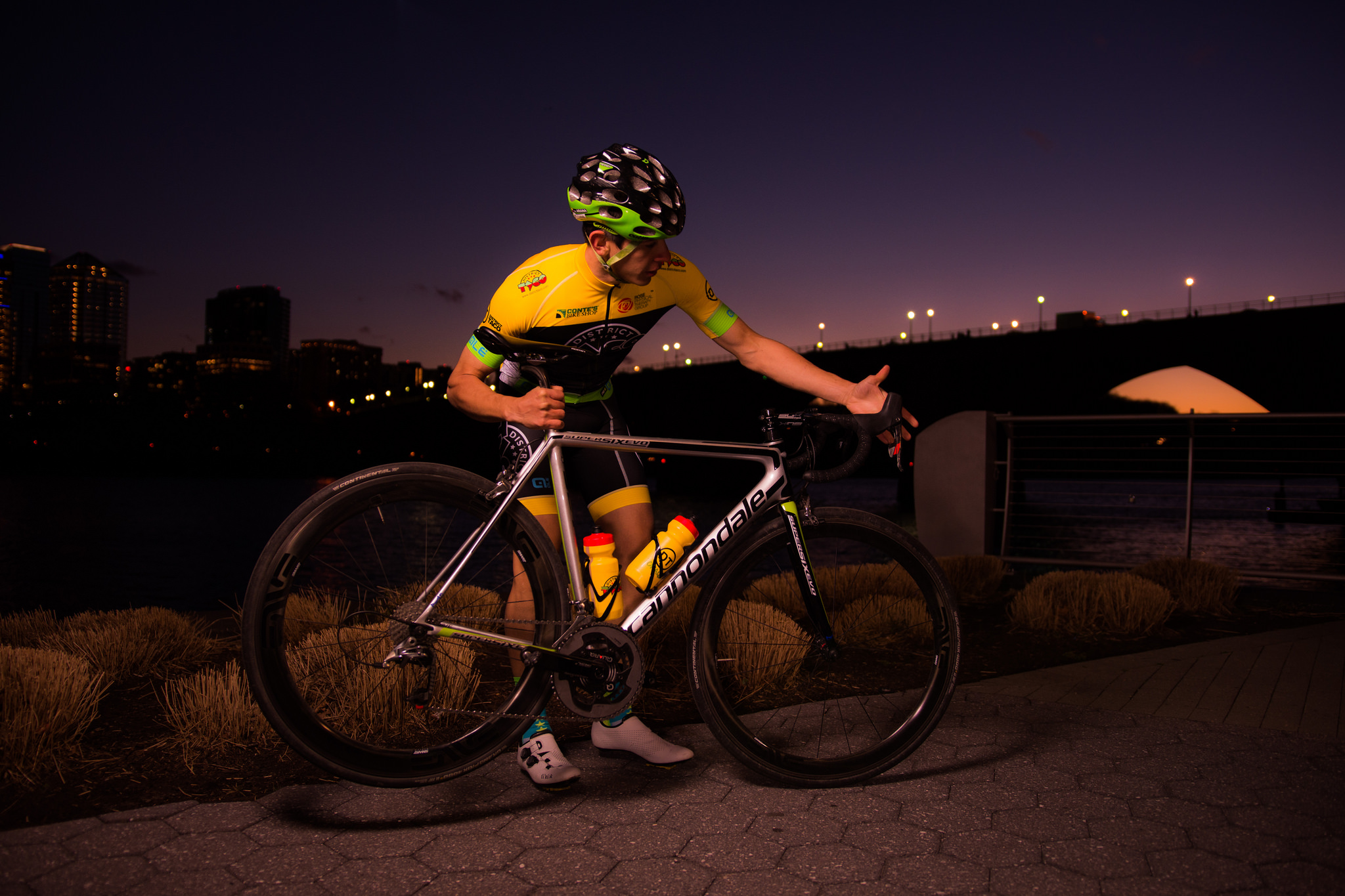 Sait working on his bicycle