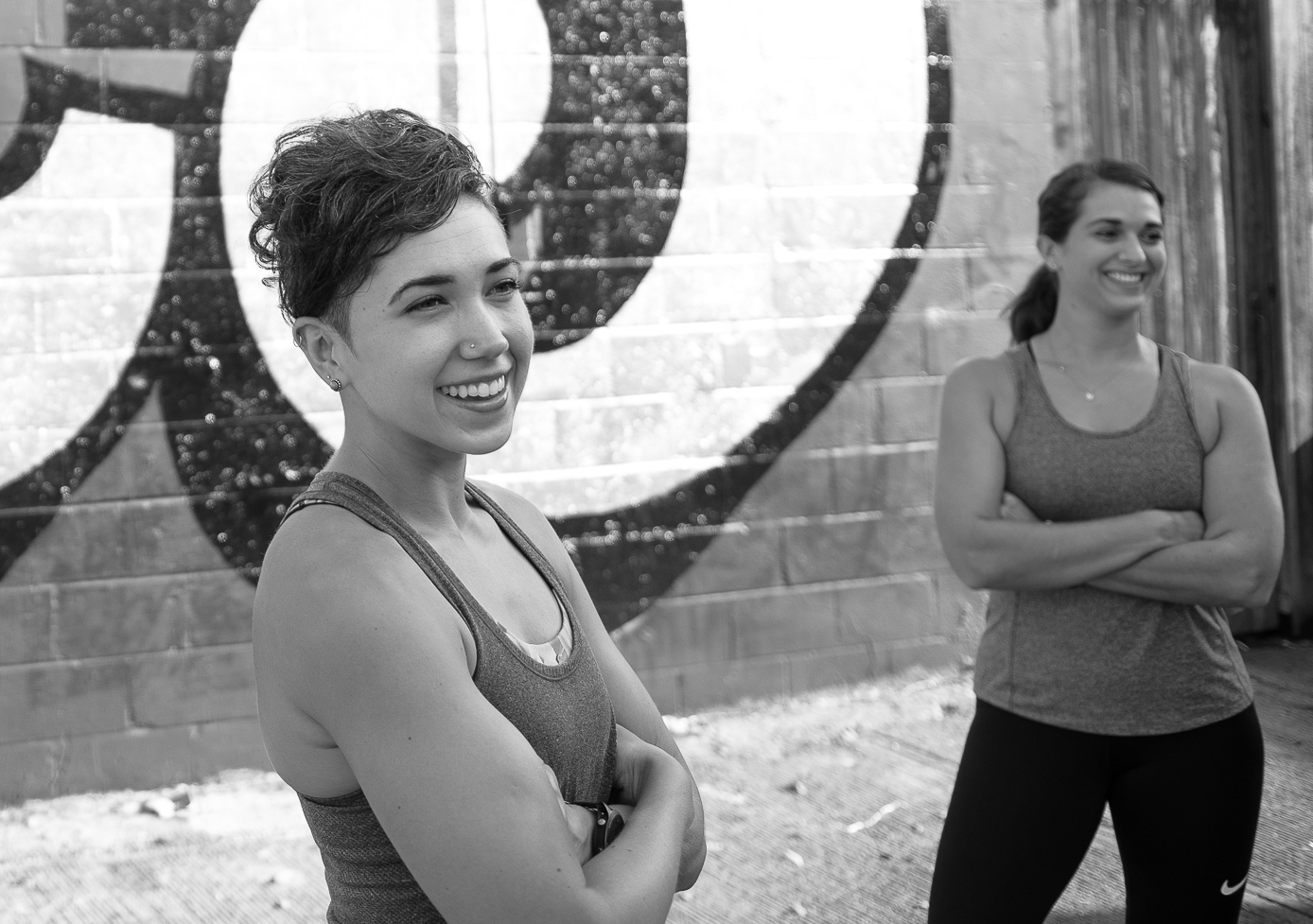 training by wall in black and white