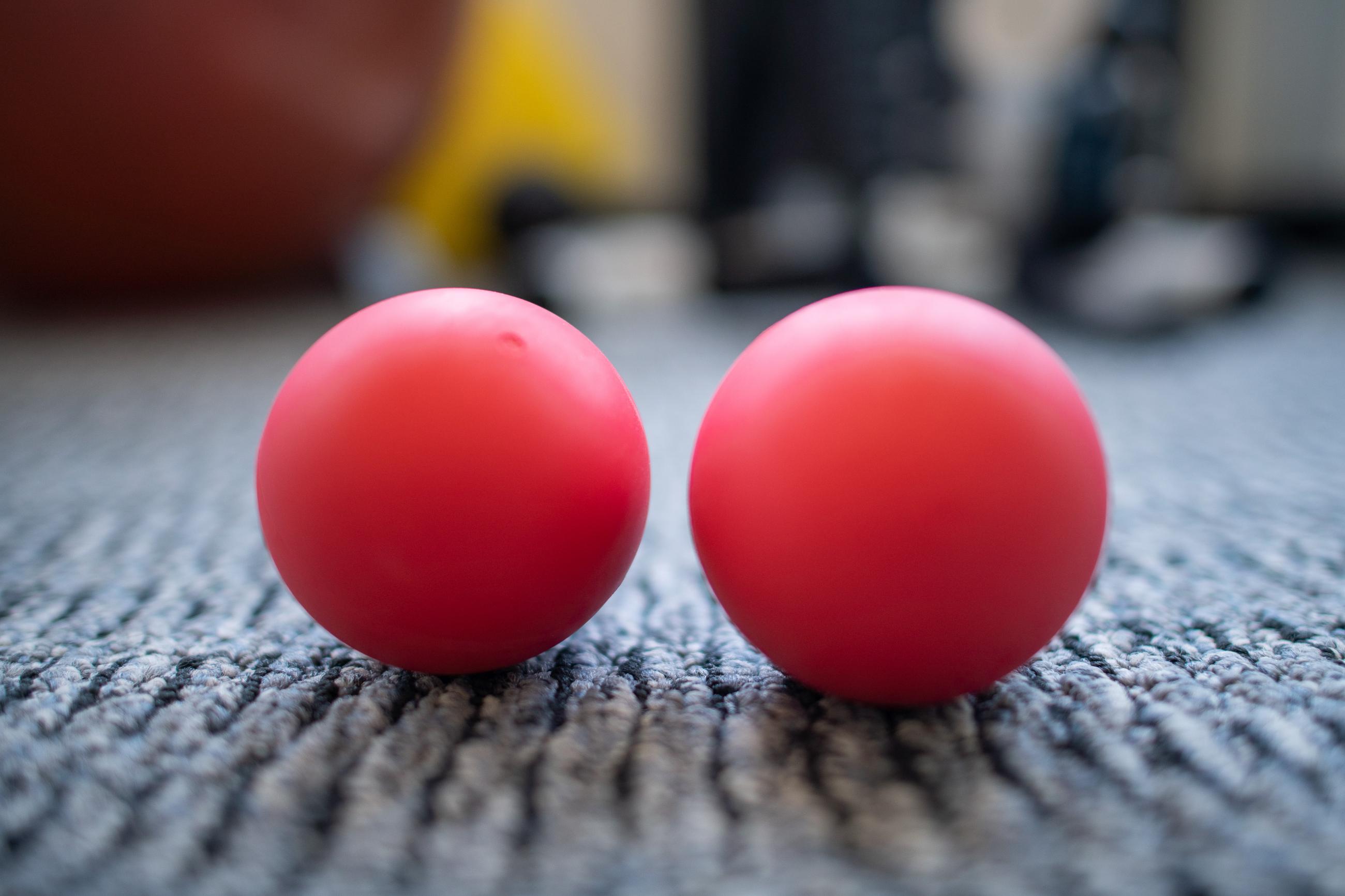 two lacrosse physical therapy balls