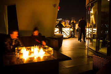 watergate hotel rooftop bar ice skating iceskating rink cost washington dc - fire pit couple on a date physical therapy
